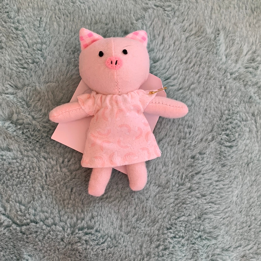Artist pig plushie