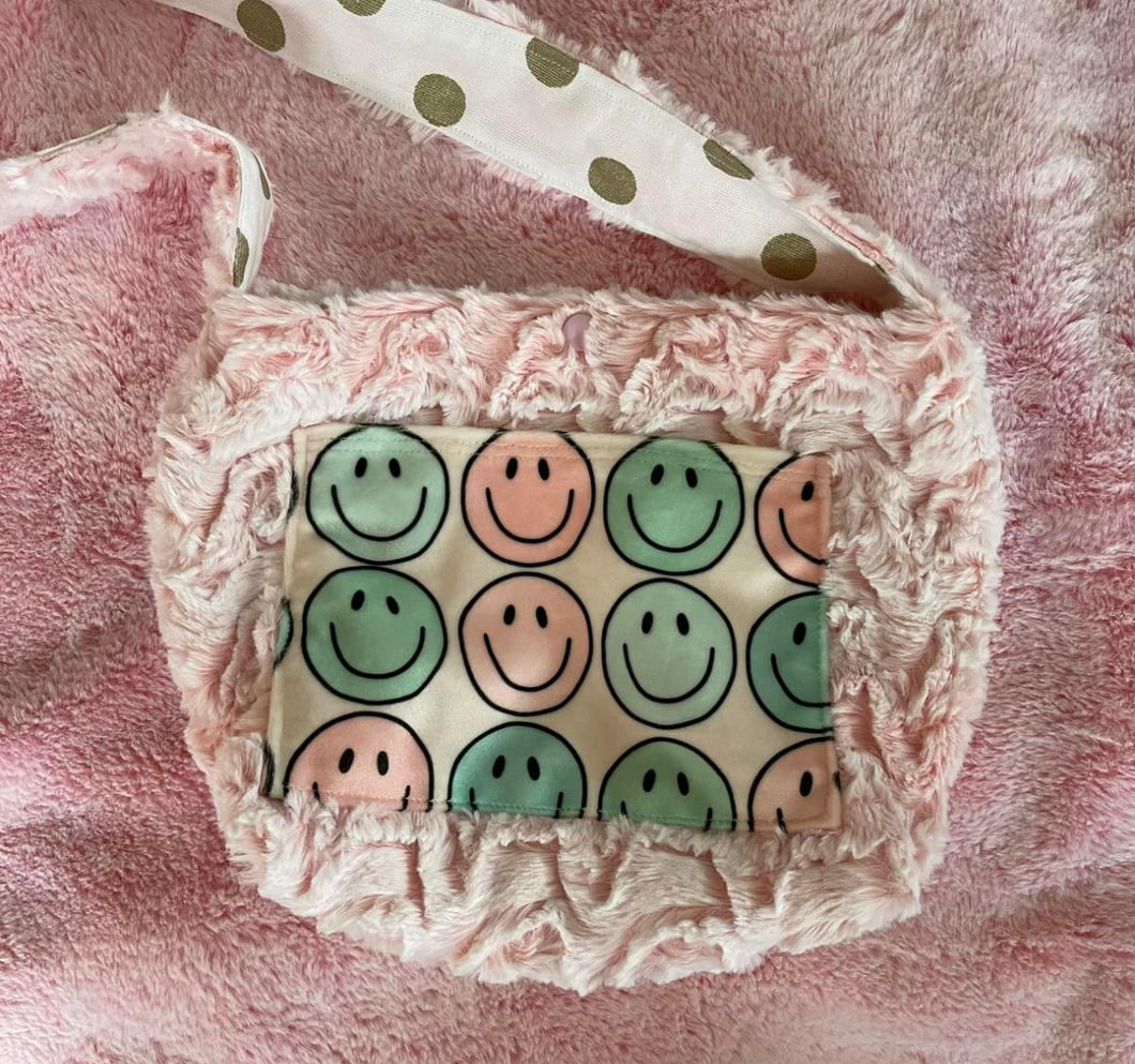 Smiley doll diaper bag