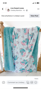 Toddler bluebird on blue snuggle blanket